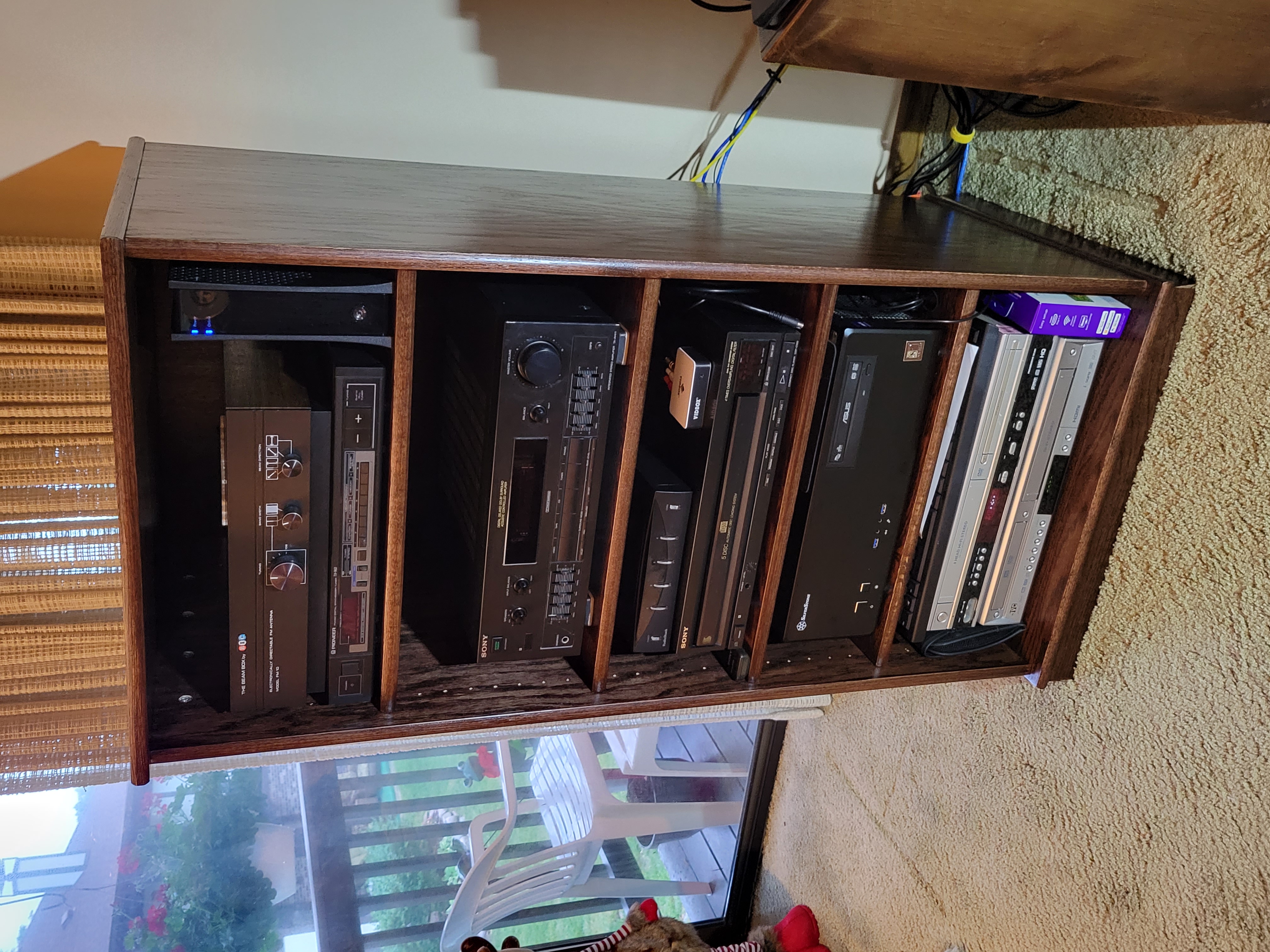 50 inch high stereo cabinet with glass doors finished in Minwax red mahogany. Gorgeous!