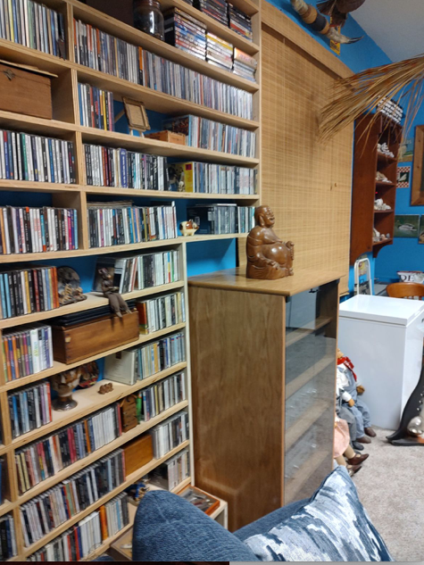 SC2248 in clear finish on oak with custom CD/DVD wall system in clear maple