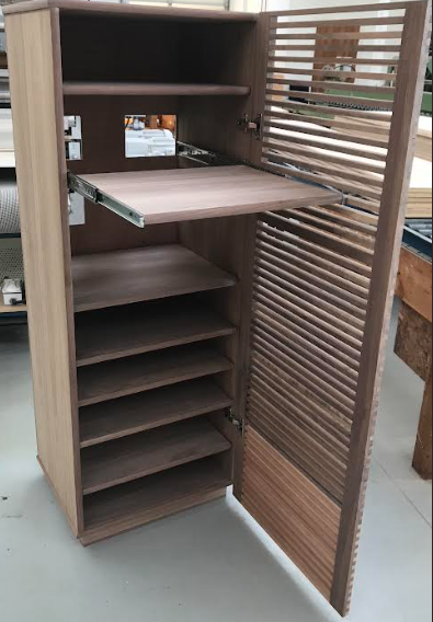 Open walnut 50"H stereo cabinet with slat door and adjustable slide shelf. Bottom door section in cherry.