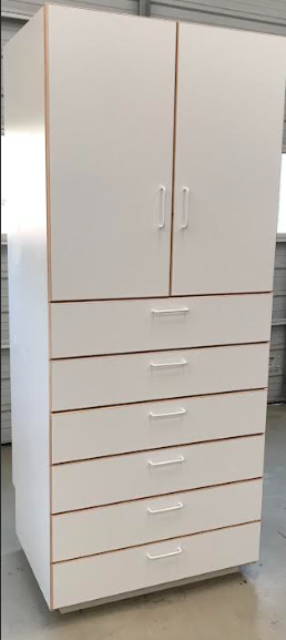 Custom artist's cabinet in white melamine banded with maple.